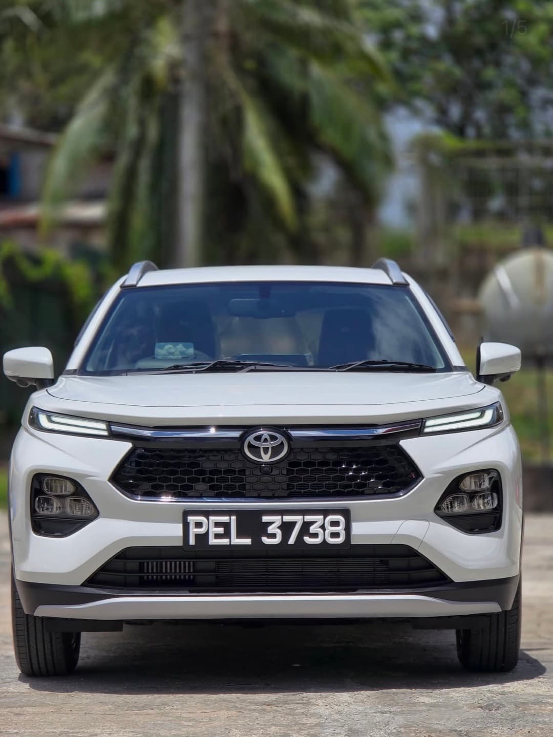 White Toyota SUV fitted with a Precision Plates number plate reading PEL 3738