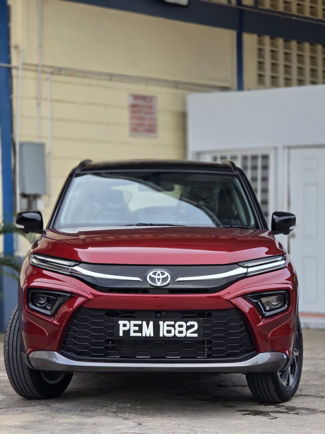 Red Toyota SUV fitted with a Precision Plates number plate reading PEM 1682